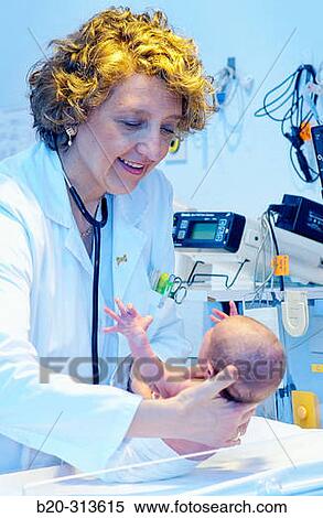 Pediatrician examinating baby at hospital View Large Photo Image Stock Photography - Pediatrician examinating baby at hospital. Fotosearch