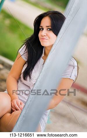 Peering behind a column young woman View Large Photo Image Stock Image - Peering behind a column young woman. Fotosearch