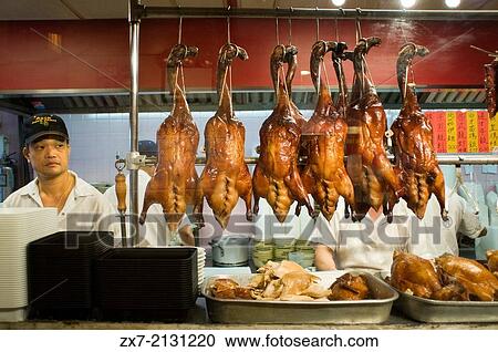 Stock Image - Peking Ducks on Display in Chinatown.. Fotosearch
