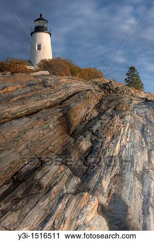 Stock Image - Pemaquid Point Lighthouse perched on fantastic rock formations, Bristol, Maine, USA. Fotosearch