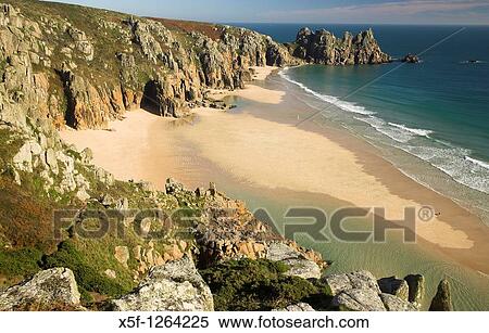 Pendnvounder Beach and Treen Cliffs with Logans Rock in the background, Cornwall View Large Photo Image Stock Photography - Pendnvounder Beach and Treen Cliffs with Logans Rock in the background, Cornwall. Fotosearch