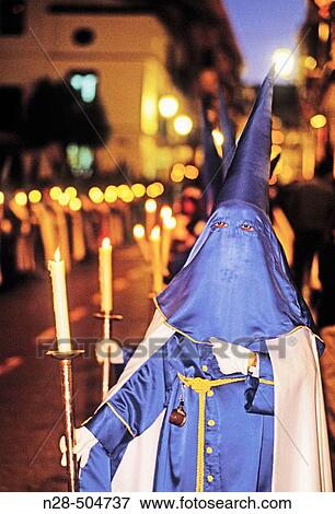 Stock Photo - Penitents in Holy Week procession. Antequera. MBlaga province, Andalusia. Spain. Fotosearch