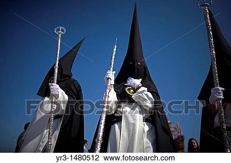 Penitents of the Jesus del Silencio brotherhood, known as the Brotherhood of Love perform in an Easter Holy Week procession in Cordoba, Andalusia, Spain, April 17, 2011 View Large Photo Image Stock Image - Penitents of the Jesus del Silencio brotherhood, known as the Brotherhood of Love perform in an Easter Holy Week procession in Cordoba, Andalusia, Spain, April 17, 2011. Fotosearch