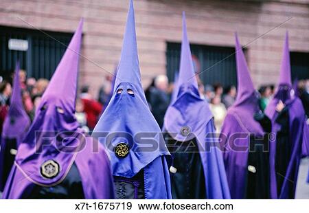 Penitents taking part in a procession, during the Semana Santa holy week festivities in Guadix, Granada Provice, Southern Spain View Large Photo Image Stock Photo - Penitents taking part in a procession, during the Semana Santa holy week festivities in Guadix, Granada Provice, Southern Spain. Fotosearch