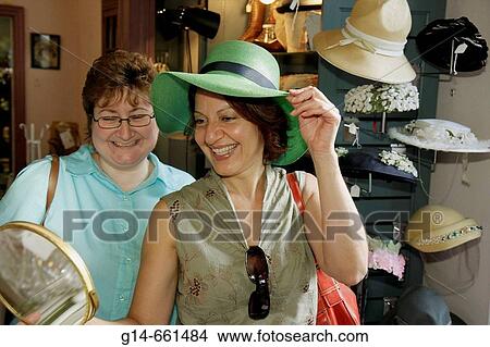 Pennsylvania, Pocono Mountains, Hawley, Church Street, Miss Elly's Antiques, collectibles, hat, woman, mirror, shopping. View Large Photo Image Picture - Pennsylvania, Pocono Mountains, Hawley, Church Street, Miss Elly's Antiques, collectibles, hat, woman, mirror, shopping.. Fotosearch