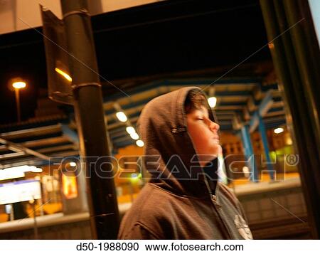 Stock Image - Pensive 12 year old in the subway, Stockholm, Sweden. Fotosearch