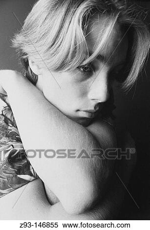 Stock Photography - Pensive teenager boy. Fotosearch