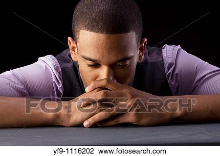 Pensive young businessman. View Large Photo Image Stock Image - Pensive young businessman.. Fotosearch