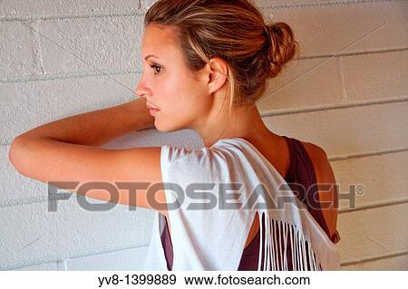 Stock Photo - Pensive young woman. Fotosearch