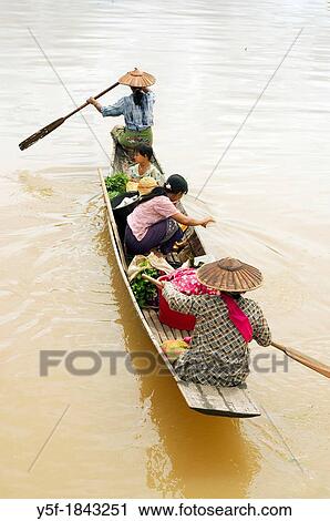 People arriving at Inle lake to sell goods View Large Photo Image Stock Image - People arriving at Inle lake to sell goods. Fotosearch