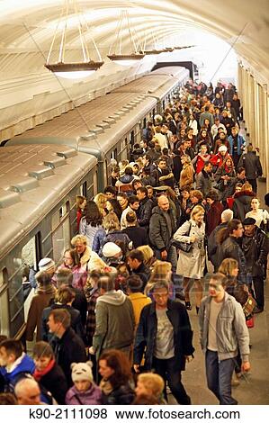 Stock Photo - People at Metro station, Moscow, Russia, Europe.. Fotosearch