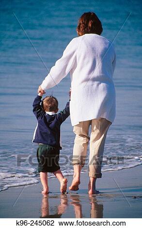 Stock Image - People at the Beach. Fotosearch