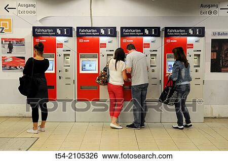 People at the ticket machine of the Deutsche Bahn AG View Large Photo Image Stock Photograph - People at the ticket machine of the Deutsche Bahn AG. Fotosearch