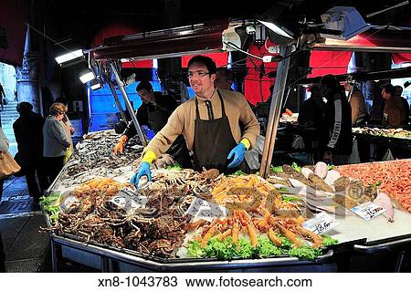 People buying fish at the Rialto Market in Venice View Large Photo Image Stock Image - People buying fish at the Rialto Market in Venice. Fotosearch