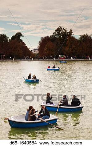 People by the Estanque lake, Parque del Buen Retiro park, Madrid, Spain View Large Photo Image Picture - People by the Estanque lake, Parque del Buen Retiro park, Madrid, Spain. Fotosearch