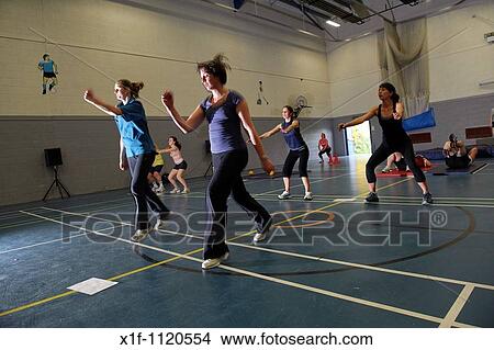 People circuit training at Aberaeron leisure centre, Ceredigion, West Wales UK View Large Photo Image Picture - People circuit training at Aberaeron leisure centre, Ceredigion, West Wales UK. Fotosearch