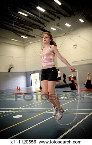 Stock Photograph - People circuit training at Aberaeron leisure centre, Ceredigion, West Wales UK. Fotosearch