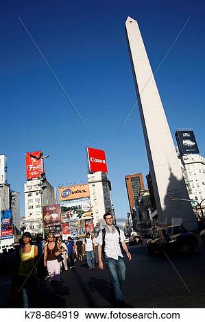 People crossing the Avenida 9 de Julio with the obelisk and plaza Republica in the background Buenos Aires, Argentina View Large Photo Image Stock Photo - People crossing the Avenida 9 de Julio with the obelisk and plaza Republica in the background Buenos Aires, Argentina. Fotosearch