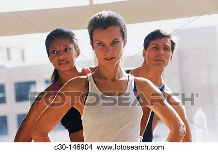 Picture - People doing stretch aerobics at gym. Fotosearch