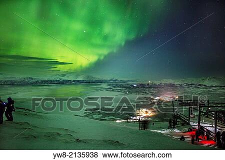 People enjoying and photographing the Aurora Borealis or Northern Lights at The Abisko Sky Station, Abisko, Lapland, Sweden. Cold temperatures as low as -47 celsius. View Large Photo Image Stock Photo - People enjoying and photographing the Aurora Borealis or Northern Lights at The Abisko Sky Station, Abisko, Lapland, Sweden. Cold temperatures as low as -47 celsius.. Fotosearch