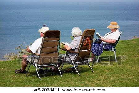 People enjoying good weather at Whitby, North Yorkshire, England, United Kingdom. View Large Photo Image Stock Image - People enjoying good weather at Whitby, North Yorkshire, England, United Kingdom.. Fotosearch