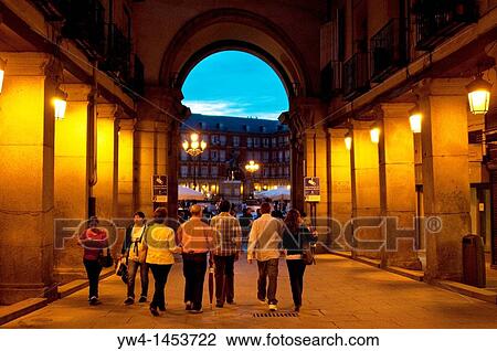 Stock Image - People going towards Plaza Mayor, Madrid, Spain. Fotosearch