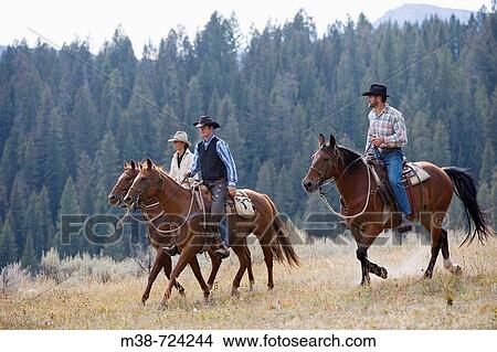 People horseback riding, Lone Mt Ranch, Big Sky, Montana, USA View Large Photo Image Picture - People horseback riding, Lone Mt Ranch, Big Sky, Montana, USA. Fotosearch