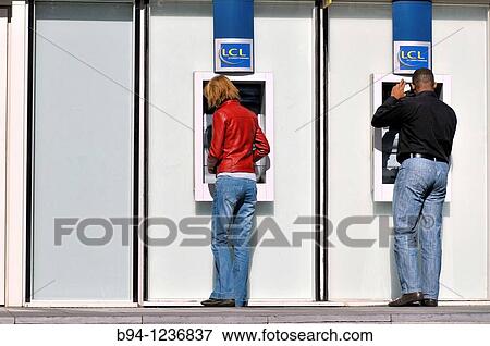 People in an ATM. Paris, France. View Large Photo Image Stock Photo - People in an ATM. Paris, France.. Fotosearch