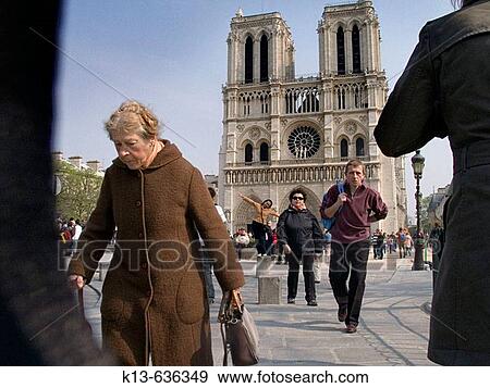 People in front of the Notre Dame cathedral, Paris. France View Large Photo Image Stock Photo - People in front of the Notre Dame cathedral, Paris. France. Fotosearch