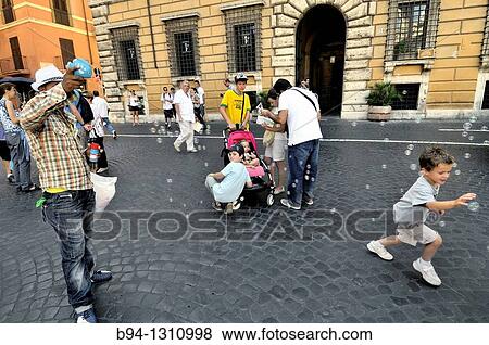 People in Piazza Navona, Rome, Italy View Large Photo Image Stock Photo - People in Piazza Navona, Rome, Italy. Fotosearch