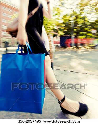 People in the street with bags, Helsinki, Finland. View Large Photo Image Stock Photography - People in the street with bags, Helsinki, Finland.. Fotosearch