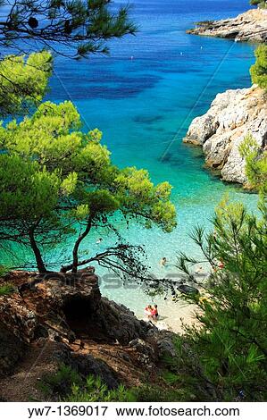 People on a beach in Jagodna village on Hvar Island, Croatia View Large Photo Image Stock Photo - People on a beach in Jagodna village on Hvar Island, Croatia. Fotosearch