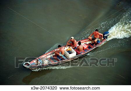 people on a canoe, rio, manaus, state of amazonas, amazon region, brazil, south america. View Large Photo Image Stock Image - people on a canoe, rio, manaus, state of amazonas, amazon region, brazil, south america.. Fotosearch