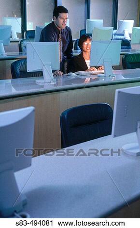 People on computer View Large Photo Image Stock Image - People on computer. Fotosearch