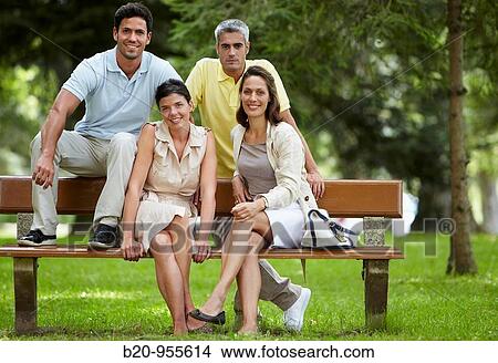 People on garden bench, spa-relais. Lierganes hotel and spa, Cantabria, Spain View Large Photo Image Picture - People on garden bench, spa-relais. Lierganes hotel and spa, Cantabria, Spain. Fotosearch