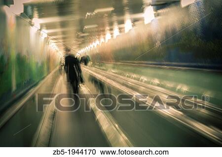 People on moving walkway to underground car park in Sydney, Australia. View Large Photo Image Stock Image - People on moving walkway to underground car park in Sydney, Australia.. Fotosearch