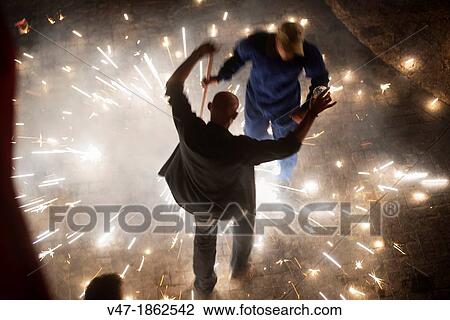 People participating in the correfoc View Large Photo Image Stock Image - People participating in the correfoc. Fotosearch