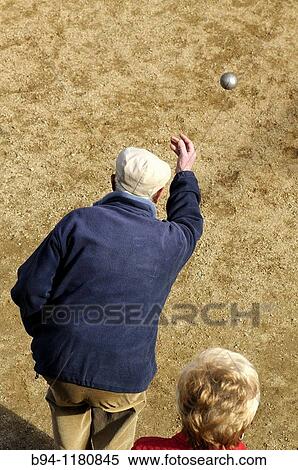 People playing boules, Barcelona, Catalonia, Spain View Large Photo Image Stock Photography - People playing boules, Barcelona, Catalonia, Spain. Fotosearch