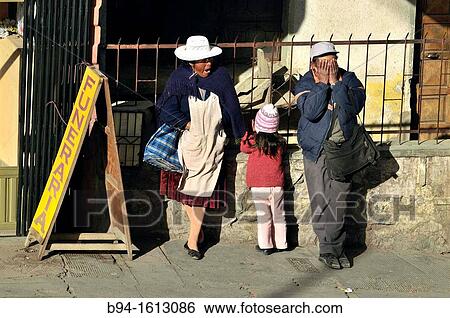 Stock Photograph - People. Potos?, city and the capital of the department of Potos? in Bolivia. It is one of the highest cities in the world by elevation at a nominal 4, 090 metres. Bolivia.. Fotosearch