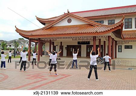 Stock Photo - People practice Tai Chi daily, early morning at friend ship garden, sarawak, malaysia. Fotosearch