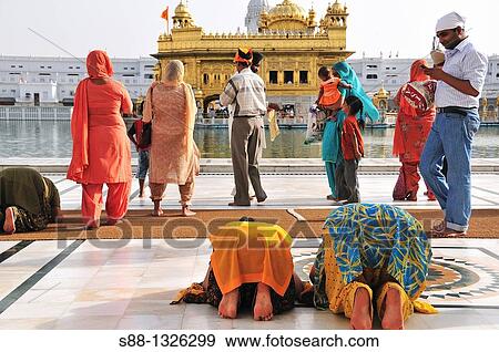 People pray for the God in Golden Temple complex, Punjab Amritsar India View Large Photo Image Stock Photo - People pray for the God in Golden Temple complex, Punjab Amritsar India. Fotosearch