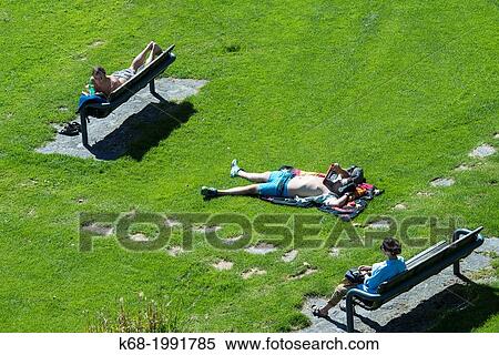 people relax in a park on a summer day, north shore of False Creek, Vancouver, BC, Canada. View Large Photo Image Stock Photography - people relax in a park on a summer day, north shore of False Creek, Vancouver, BC, Canada.. Fotosearch