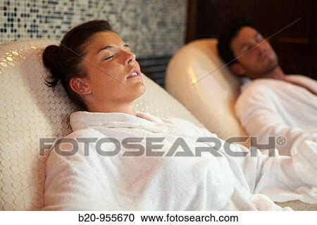 People relaxing on hot stone seats, spa-relais. Lierganes hotel and spa, Cantabria, Spain View Large Photo Image Stock Image - People relaxing on hot stone seats, spa-relais. Lierganes hotel and spa, Cantabria, Spain. Fotosearch