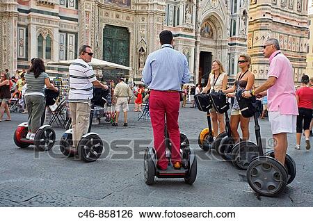 People riding segways in front of the cathedral, Florence, Tuscany, Italy View Large Photo Image Stock Photograph - People riding segways in front of the cathedral, Florence, Tuscany, Italy. Fotosearch