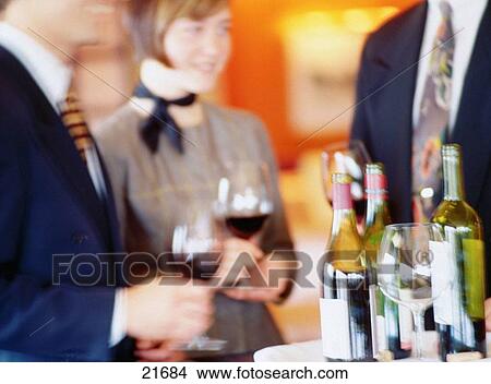 People sampling wine at wine tasting View Large Photo Image Picture - People sampling wine at wine tasting. Fotosearch
