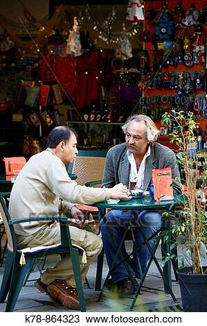 People sitting at a outdoors cafe, Istanbul, Turkey View Large Photo Image Stock Image - People sitting at a outdoors cafe, Istanbul, Turkey. Fotosearch