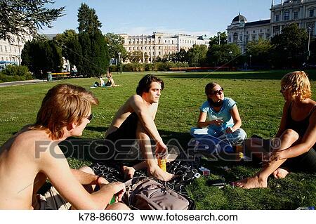 People sitting at a public park, Vienna, Austria View Large Photo Image Stock Image - People sitting at a public park, Vienna, Austria. Fotosearch