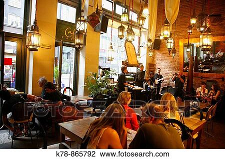 People sitting at Le Patio Cafe and Restaurant on Narodni Trida street, Nove Mesto, Prague, Czech Republic View Large Photo Image Stock Image - People sitting at Le Patio Cafe and Restaurant on Narodni Trida street, Nove Mesto, Prague, Czech Republic. Fotosearch