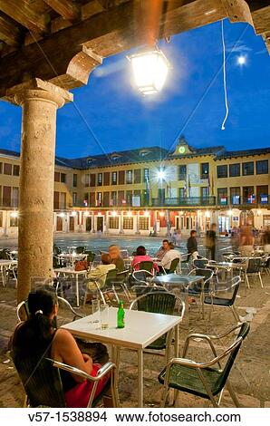 People sitting on terraces at Main Square, night view. Tordesillas, Valladolid province, Castilla Le? n, Spain. View Large Photo Image Picture - People sitting on terraces at Main Square, night view. Tordesillas, Valladolid province, Castilla Le? n, Spain.. Fotosearch