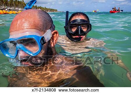 People snorkeling in Bavaro Beach, Punta Cana, Dominican Republic. View Large Photo Image Stock Photo - People snorkeling in Bavaro Beach, Punta Cana, Dominican Republic.. Fotosearch